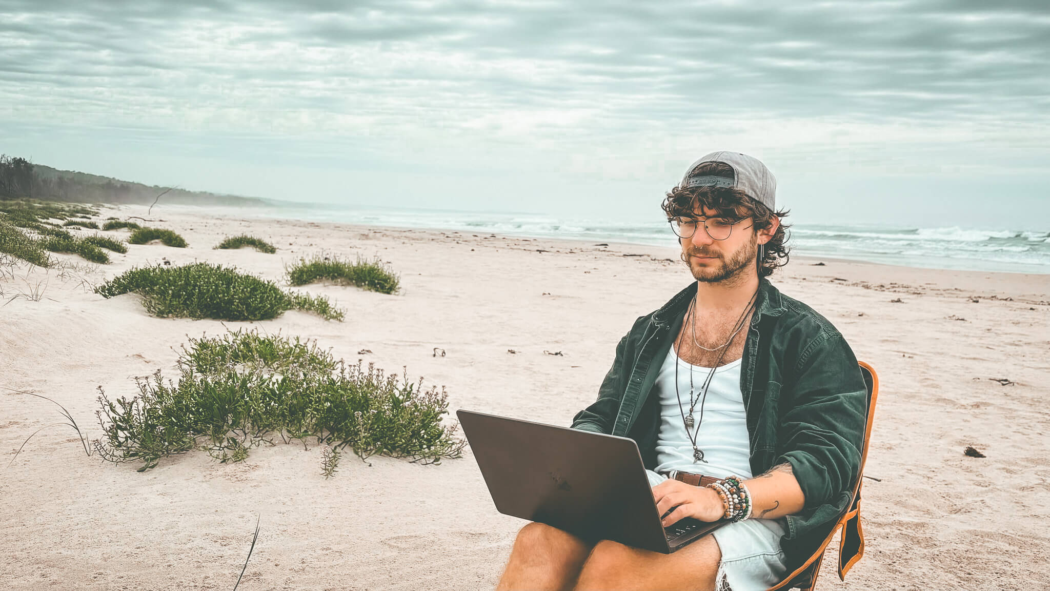 Person working on laptop outdoors